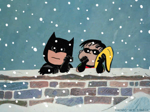 Charlie Brown and Linus dressed as Batman and Robin in the snow, as per scene from A Charlie Brown Christmas